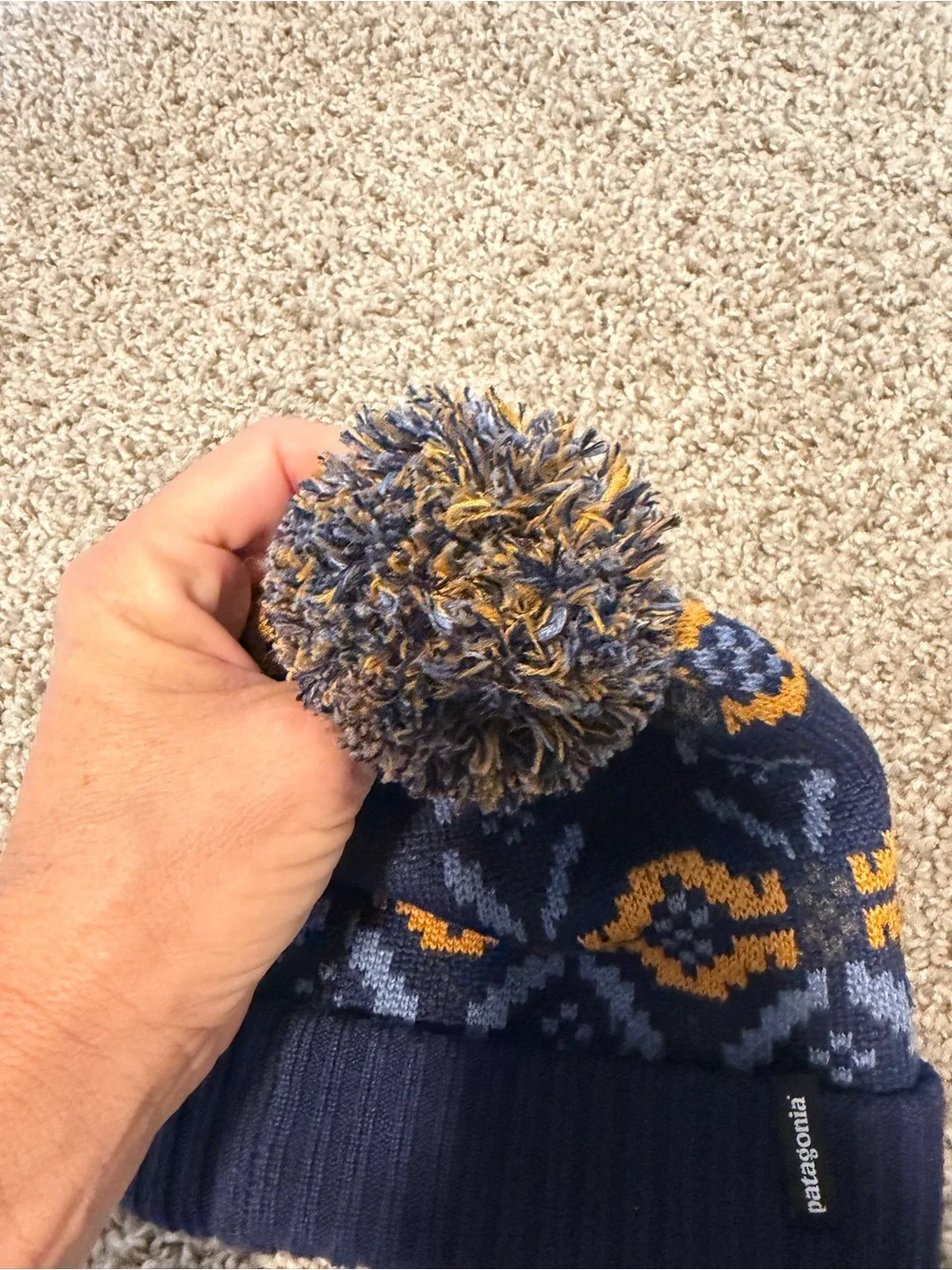 Patagonia Kids Navy Beanie with Yellow and Light Blue Pattern Pom